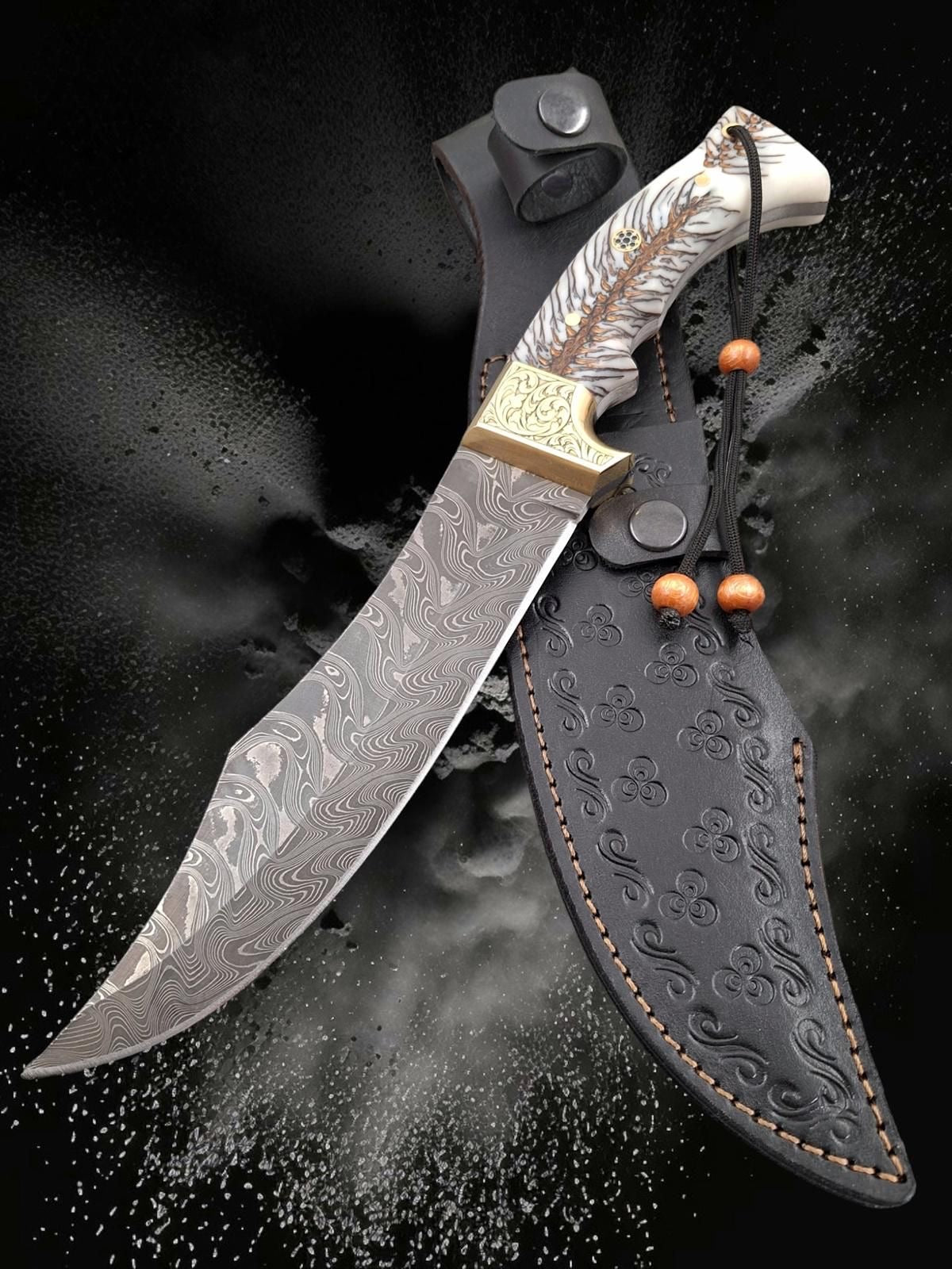Handmade Damascus Bowie knife with eagle-engraved white resin handle and black embossed leather sheath, original product photo