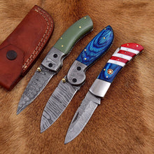 Load image into Gallery viewer, HS Deal 07 - Premium Damascus Folding Knife Set - 3 Pieces with Unique Handles (Green Resin, Blue Wood, USA Design) - Handcrafted Excellence, 512 Layers, and Custom Leather Sheaths