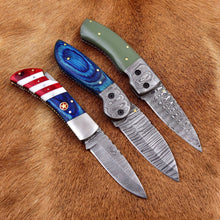 Load image into Gallery viewer, HS Deal 07 - Premium Damascus Folding Knife Set - 3 Pieces with Unique Handles (Green Resin, Blue Wood, USA Design) - Handcrafted Excellence, 512 Layers, and Custom Leather Sheaths