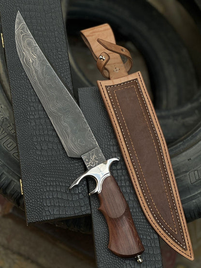 Handmade Damascus steel Bowie knife with long wavy Damascus blade crescent hawk-bill guard rosewood handle and brown leather sheath with belt loop