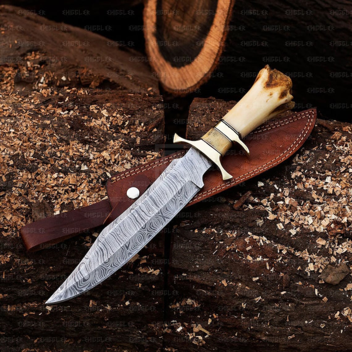 damascus-steel-bowie-knife-bone-handle-brass-crossguard-brown-leather-sheath-outdoor