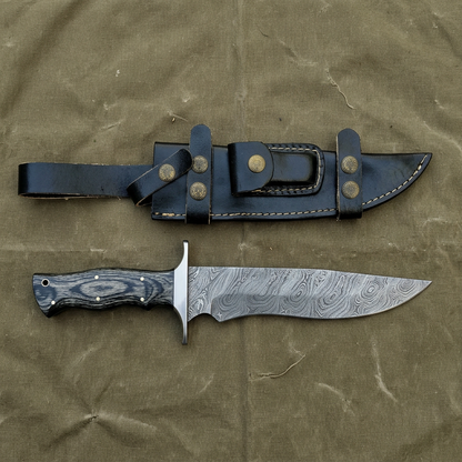 Overhead display of 13-inch Damascus Bowie and leather sheath