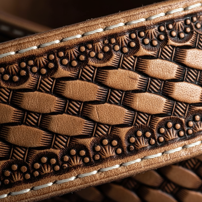 Basket weave hand-tooled leather engraving macro close-up white stitching western belt