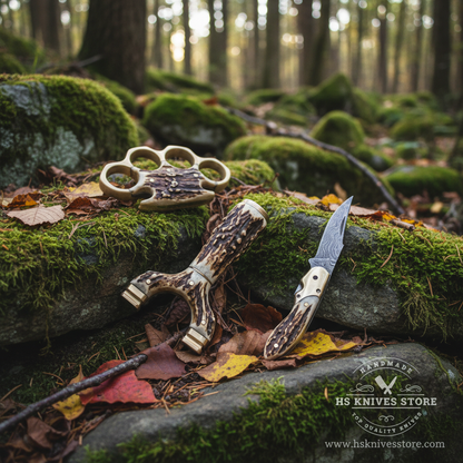 3-piece stag antler collector gift set resting on mossy rocks in outdoor forest setting all pieces clearly visible