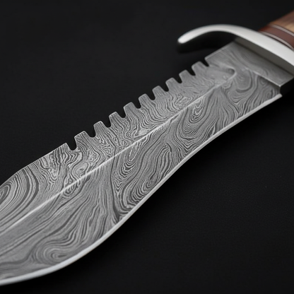 Damascus Bowie knife blade serrated spine wave pattern close-up