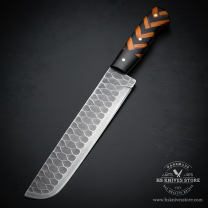 Close-up of the geometric honeycomb Damascus pattern on a long brisket slicing knife blade