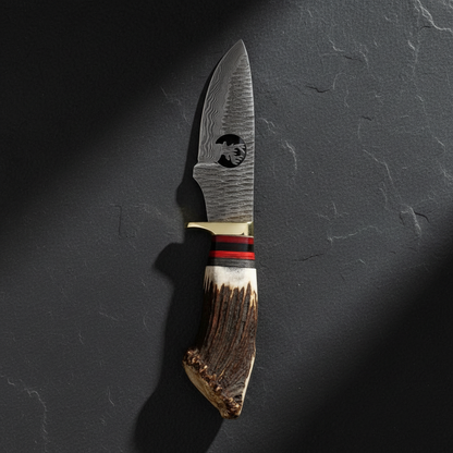 Damascus skinner knife vertical luxury slate background