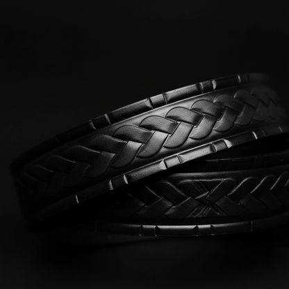 Braided woven embossed pattern macro close-up black leather western belt detail