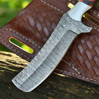 Close-up of the flowing Damascus pattern on a handmade hardwood handle bull cutter knife