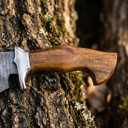 Polished rosewood handle close-up showing natural grain and hooked butt