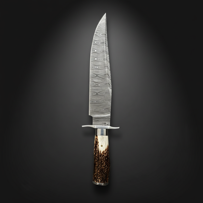 Damascus Bowie knife vertical luxury shot on dark charcoal gray background blade pointing up stag horn handle