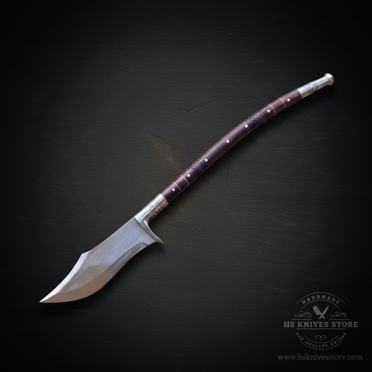 Single fantasy spear collector piece with broad steel head and curved rosewood shaft on dark charcoal background