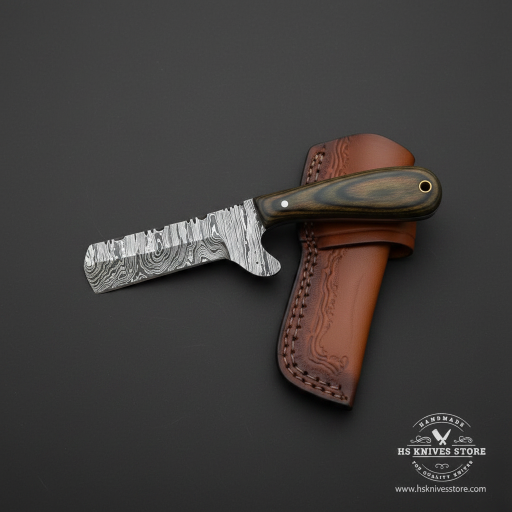 Damascus bull cutter cowboy knife with dark pakkawood handle and tan leather sheath studio mirror view facing left dark background