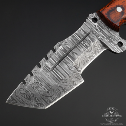 Close-up macro of Damascus steel tracker blade showing bold flowing wood grain ladder Damascus pattern and dark fuller groove and thick spine