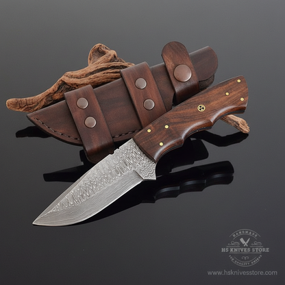 Damascus steel skinner knife walnut handle brass star rivet dark brown leather sheath dark charcoal studio mirror