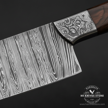 Damascus steel chef knife blade ladder pattern macro close-up engraved bolster detail