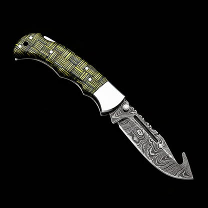 Damascus folding knife woven composite handle black studio right facing product shot