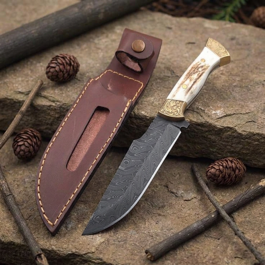 Left woodland view of 13-inch overall Damascus hunting Bowie knife with decorative fittings