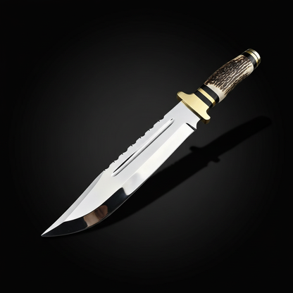Handmade D2 steel Bowie knife with mirror polished blade and stag antler handle on black studio background left facing
