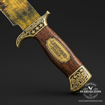 Close-up of the wood-look Lightning Strike handle plaque and ornate gold-tone pommel