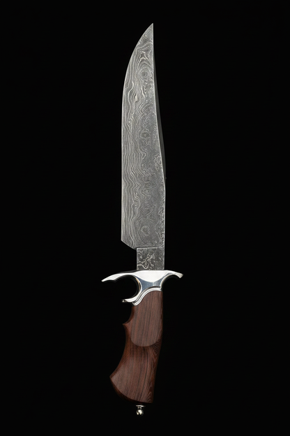 Handmade Damascus Bowie knife with wavy Damascus blade crescent guard and rosewood handle on black background dramatic studio lighting