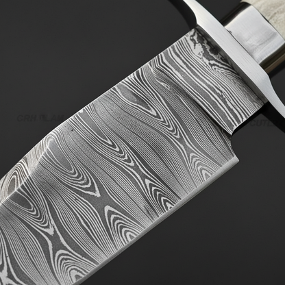 Flowing Damascus steel blade pattern macro close-up on Bowie knife clip point blade