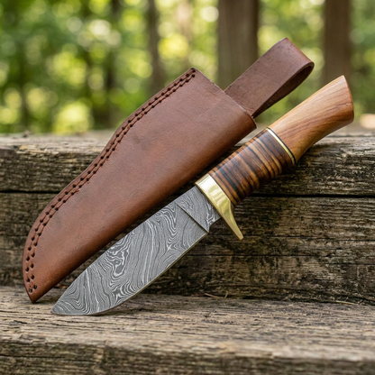 Right-angle view of Damascus skinner and separate sheath at a rustic campsite