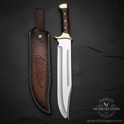 Vertical luxury shot of D2 steel Bowie knife dark rosewood handle on dark slate background with dark brown floral leather sheath