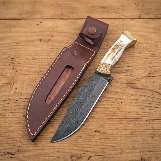 Front view of Damascus hunting Bowie knife with stag handle and brown leather sheath