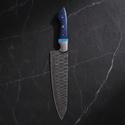 Damascus chef knife vertical luxury slate background blade pointing upward editorial shot