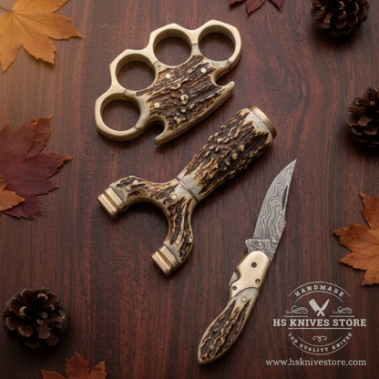 3-piece stag antler collector gift set flat lay on rustic dark walnut wood surface with autumn leaves and pine cones