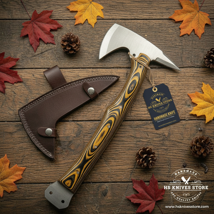 Flat lay carbon steel tomahawk axe yellow black pakkawood handle HS Knives Store hang tag dark rustic wood autumn leaves