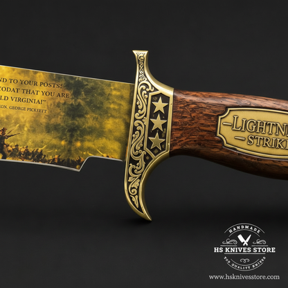 Close-up of the Lightning Strike Bowie knife ornate scrollwork guard and three-star detail