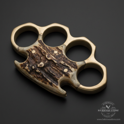Close-up macro of brass frame with natural stag antler inlay panels and brass rivets collector piece detail