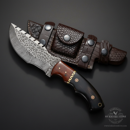 Damascus steel tracker knife buffalo horn rosewood handle crocodile leather sheath dark charcoal studio background right