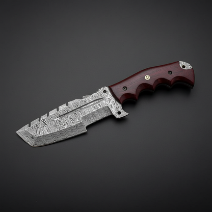 Damascus tracker knife with rosewood handle overhead flat lay left facing dark charcoal background