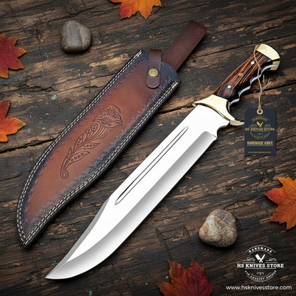 D2 steel Bowie knife dark rosewood handle flat lay on dark rustic wood with HS Knives Store hang tag attached autumn leaves