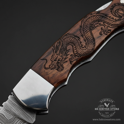Close-up macro of dragon engraved rosewood handle showing detailed dragon scales claws and curling tail with silver rivets and steel bolster