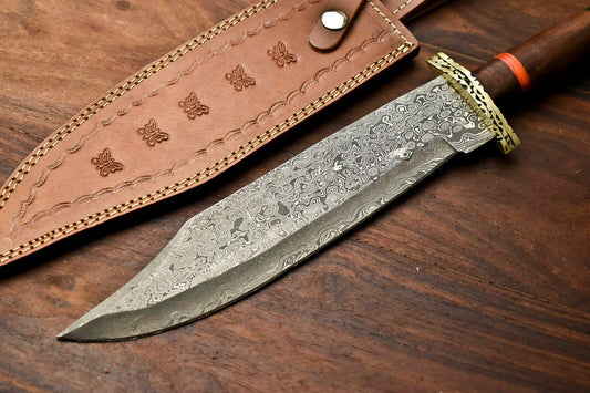 Decorative knife with a leather sheath on a wooden surface