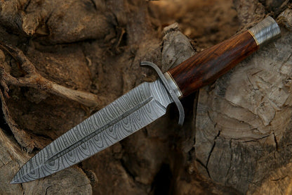 sharp damascus steel dagger close view
