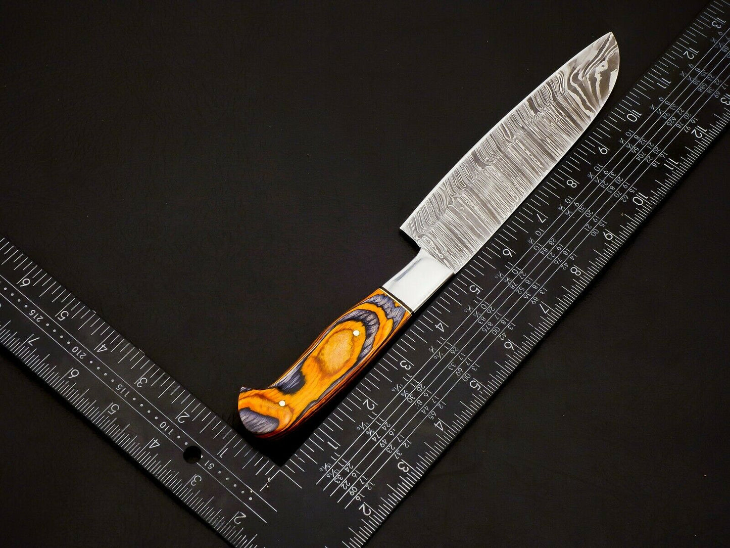 Premium Damascus kitchen knife set with detailed blade pattern