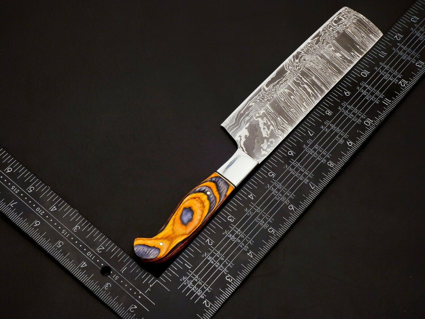 Damascus knife set 1095 and 15N20 steel layered blades close shot