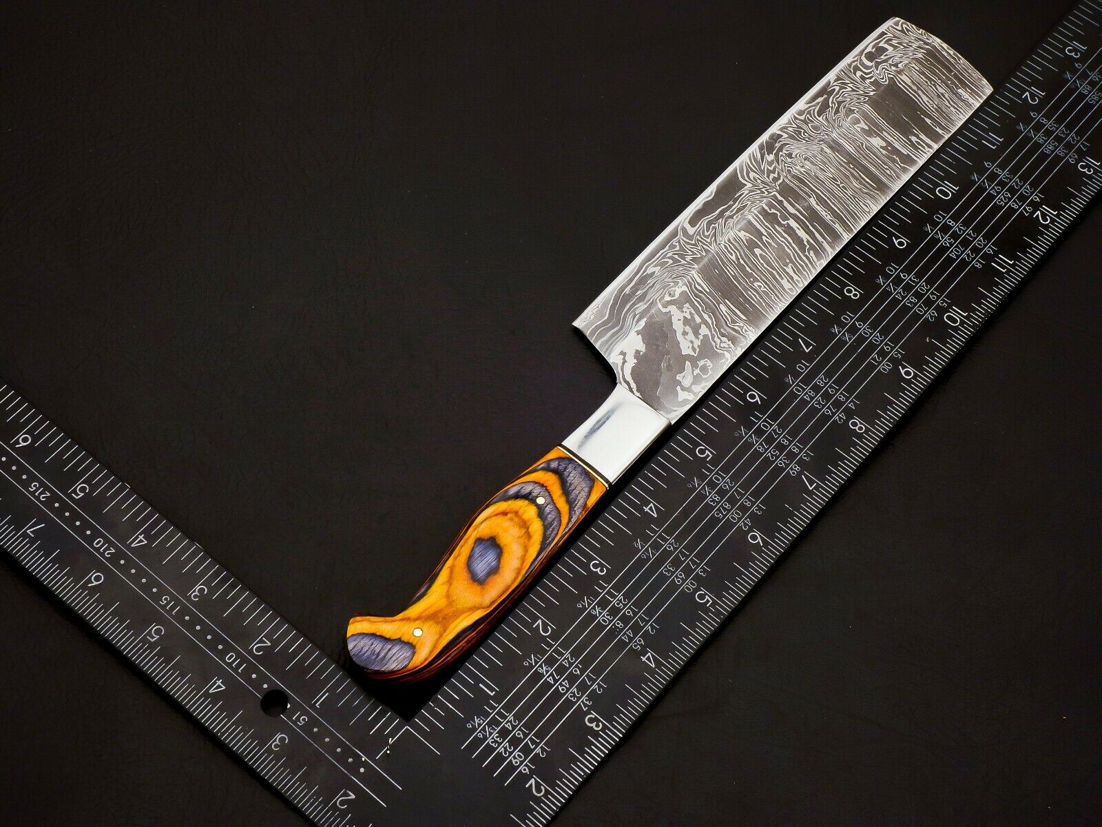Damascus knife set 1095 and 15N20 steel layered blades close shot
