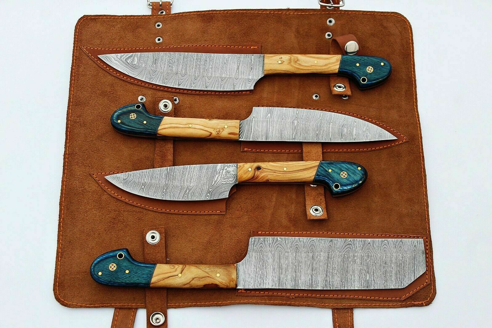 Complete Damascus kitchen knife set showing multiple sizes and professional chef knives collection